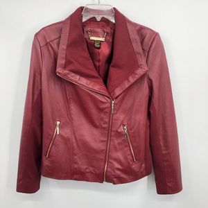 IMAN leather jacket runs LARGE but is medium
